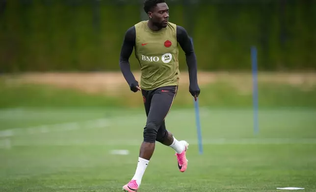 Canada's Alphonso Davies participates in a World Cup soccer training session in Vancouver, British Columbia, Thursday, June 25, 2026. (Darryl Dyck/The Canadian Press via AP)
