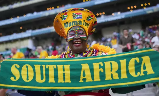 South African soccer fan Mama Joy cheers ahead of the World Cup Group A soccer match between South Africa and South Korea in Guadalupe, near Monterrey, Mexico, Wednesday, June 24, 2026. (AP Photo/Matias Delacroix)