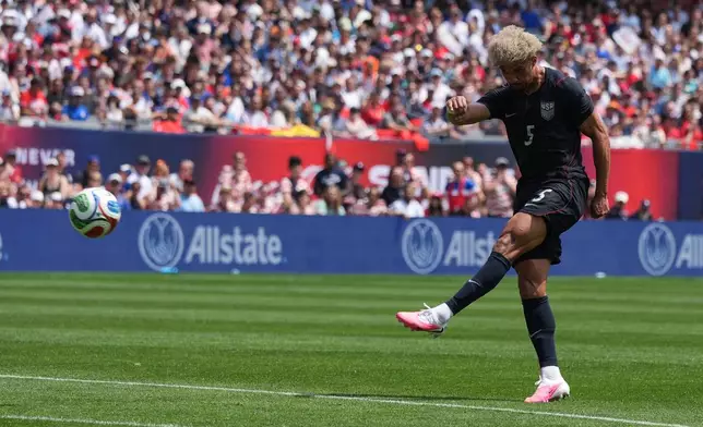 United States defender Antonee Robinson scores against Germany during the first half of an international friendly soccer match in Chicago, Saturday, June 6, 2026. (AP Photo/Nam Y. Huh)