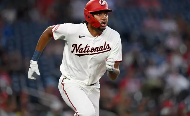 Washington Nationals' James Wood runs after hitting a double during the first inning of a baseball game against the Philadelphia Phillies, Monday, June 22, 2026, in Washington. (AP Photo/John McDonnell) CORRECTION: Wood hit a double not a single.