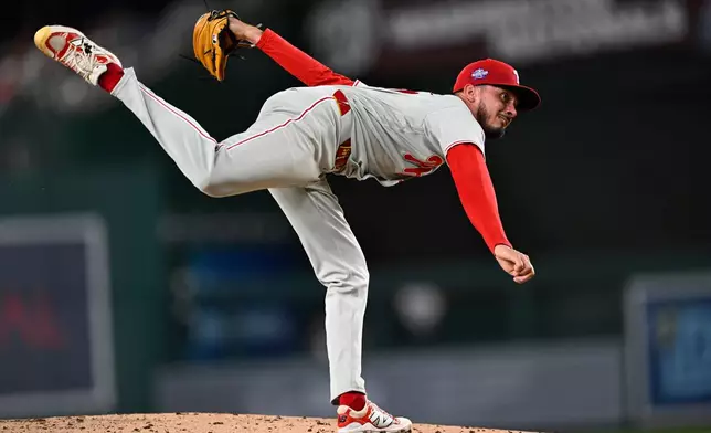Philadelphia Phillies pitcher Alan Rangel follows through during the second inning of a baseball game against the Washington Nationals, Monday, June 22, 2026, in Washington. (AP Photo/John McDonnell)