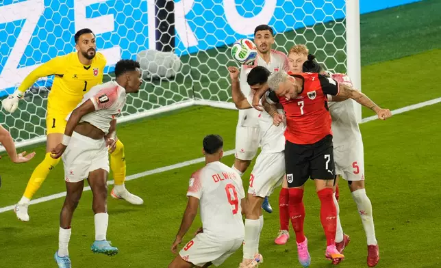 Jordan's Yazan Alarab, right, scores on his own goal during the World Cup Group J soccer match against Austria in Santa Clara, Calif., near San Francisco, Tuesday, June 16, 2026. (AP Photo/Jeff Chiu)