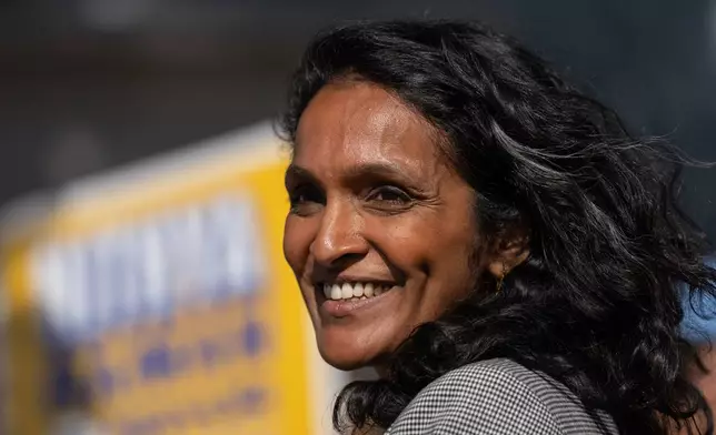 Nithya Raman, a candidate in the Los Angeles mayoral race, smiles during a campaign event discussing tenant protections with renters in Los Angeles, Monday, June 1, 2026. (AP Photo/Jae C. Hong)