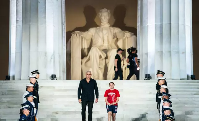 UFC fighter Alex Pereira attends a UFC news conference at the Lincoln Memorial, ahead of Sunday's fight on the South Lawn of the White House, Friday, June 12, 2026, in Washington. (AP Photo/Allison Robbert)