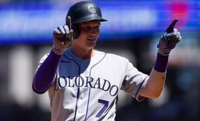 Athletics' TJ Rumfield reacts after hitting an RBI triple during the seventh inning of a baseball game, Sunday, June 14, 2026, in Las Vegas. (AP Photo/Caroline Brehman)
