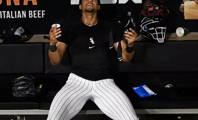 Chicago White Sox's Braden Montgomery celebrates in the dugout after hitting a walk-off two-run home in the 10th inning of a baseball game against the Atlanta Braves in Chicago, Tuesday, June 9, 2026. (AP Photo/Paul Beaty)