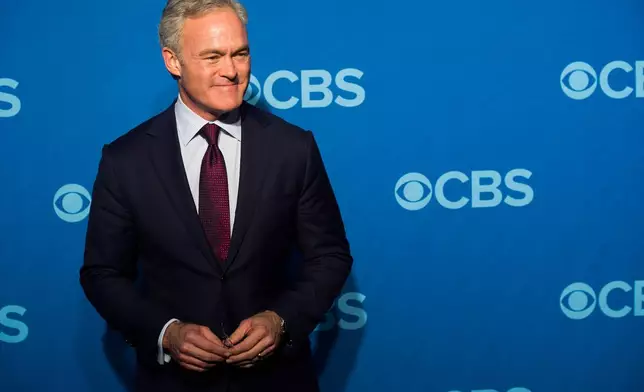 FILE - Scott Pelley, anchor of "CBS Evening News," at the CBS Upfront in New York, May 15, 2013. (Photo by Charles Sykes/Invision/AP, File)