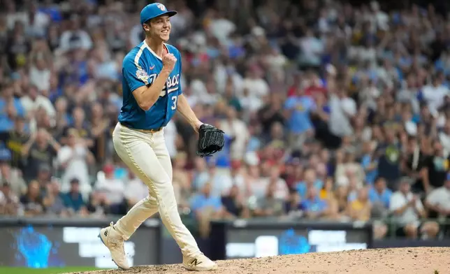 Milwaukee Brewers' Jacob Misiorowski reacts after striking out a Philadelphia Phillies batter during the eighth inning of a baseball game Friday, June 12, 2026, in Milwaukee. (AP Photo/Aaron Gash)