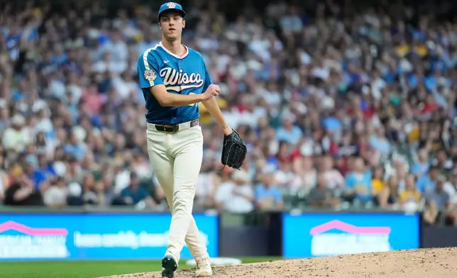 Milwaukee Brewers' Jacob Misiorowski walks to the dugout during the sixth inning of a baseball game against the Philadelphia Phillies, Friday, June 12, 2026, in Milwaukee. (AP Photo/Aaron Gash)