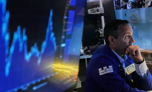 Specialist Michael Gagliano works at his post on the floor of the New York Stock Exchange, Thursday, June 25, 2026. (AP Photo/Richard Drew)