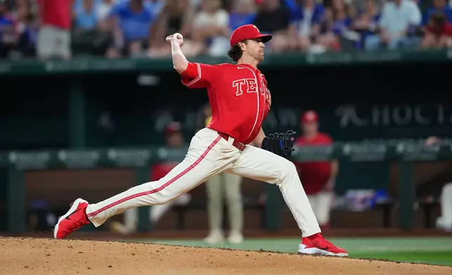 Texas Rangers starting pitcher Jacob Degrom throws to the San Diego Padres during the fourth inning of a baseball game, Friday, June 19, 2026 in Arlington, Texas. (AP Photo/Julio Cortez)