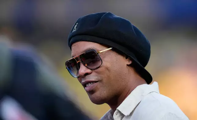 Former Brazilian soccer player Ronaldinho watches before the World Cup Group C soccer match between Brazil and Haiti in Philadelphia, Friday, June 19, 2026. (AP Photo/Petr David Josek)