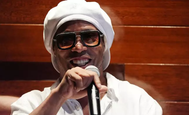 Brazilian football legend Ronaldinho speaks during a media event celebrating his recent signing with Italian soccer club Ravenna FC, at Cipriani Downtown Miami restaurant, Tuesday, June 23, 2026, in Miami. (AP Photo/Rebecca Blackwell)