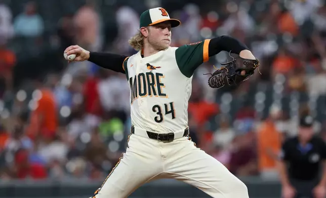 Baltimore Orioles pitcher Shane Baz throws during the third inning of a baseball game against the San Diego Padres, Friday, June 12, 2026, in Baltimore. (AP Photo/Terrance Williams)