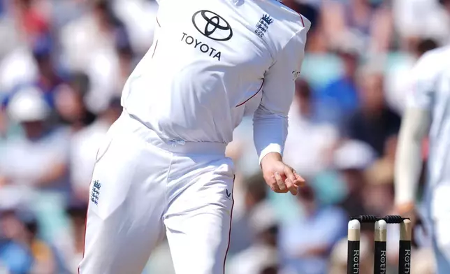 England's Joe Root bowls on day three of the second cricket test between England and New Zealand, in London, Friday June 19, 2026. (Ben Whitley/PA via AP)