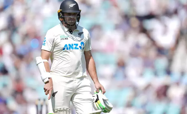 New Zealand's Tom Latham leaves the field after being dismissed on day three of the second cricket test between England and New Zealand, in London, Friday June 19, 2026. (Ben Whitley/PA via AP)