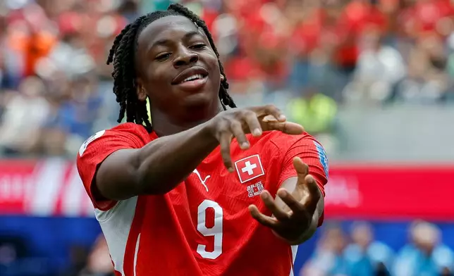 Switzerland's Johan Manzambi celebrates after scoring the opening goal against Bosnia during the World Cup Group B soccer match in Inglewood, Calif., near Los Angeles, Thursday, June 18, 2026. (Peter Klaunzer/Keystone via AP)