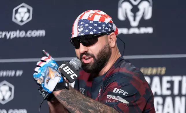 UFC heavyweight fighter Josh Hokit speaks to reporters during the UFC Freedom 250 media day, Wednesday, June 10, 2026, in Washington. (AP Photo/Manuel Balce Ceneta)