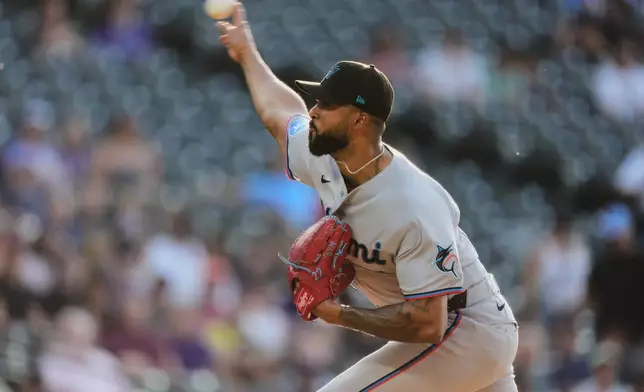 Miami Marlins starting pitcher Sandy Alcantara works against the Colorado Rockies in the first inning of a baseball game Monday, June 29, 2026, in Denver. (AP Photo/David Zalubowski)
