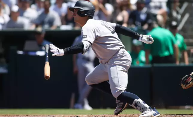 New York Yankees' Anthony Volpe hits an RBI single during the third inning of a baseball game against the Athletics ,Sunday, May 31, 2026, in West Sacramento, Calif. (AP Photo/Scott Marshall)