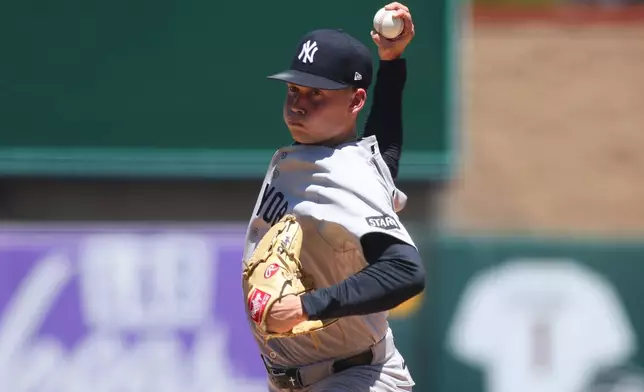 New York Yankees pitcher Will Warren throws to an Athletics batter during the first inning of a baseball game Sunday, May 31, 2026, in West Sacramento, Calif. (AP Photo/Scott Marshall)