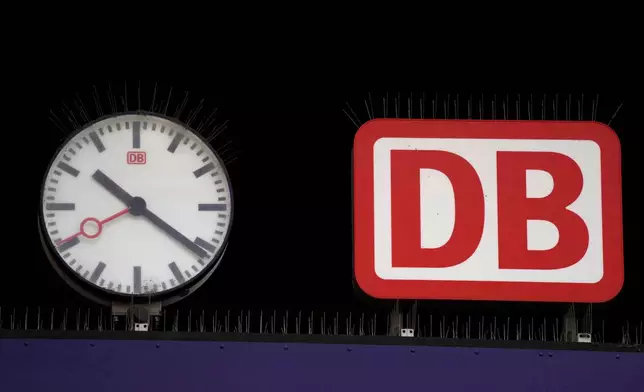 FILE - The logo of Deutsche Bahn is pictured at the central station in Munich, Germany, Jan. 24, 2024. (AP Photo/Matthias Schrader, file)