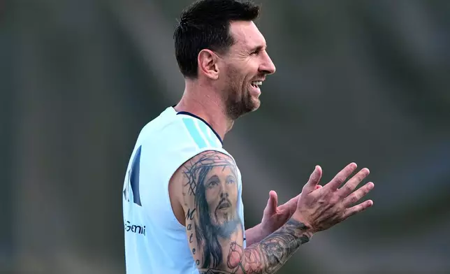 Argentina's Lionel Messi watches training for the World Cup soccer tournament Wednesday, June 24, 2026, in Kansas City, Kan. (AP Photo/Charlie Riedel)