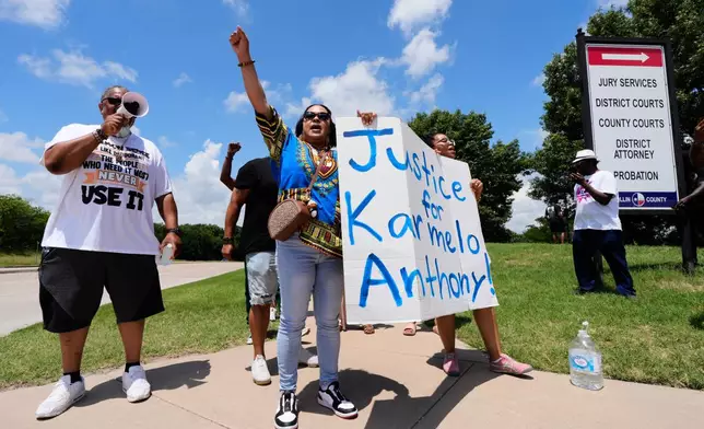 Supporters for Karmelo Anthony demonstrate in front of the Collin County courthouse Thursday, June 4, 2026, in McKinney, Texas. (AP Photo/Tony Gutierrez)