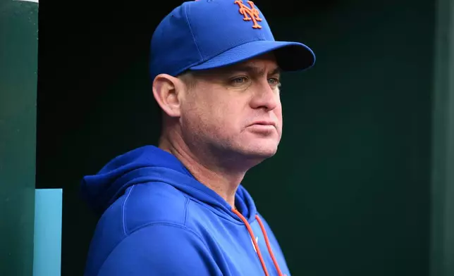 FILE - New York Mets manager Carlos Mendoza before a baseball game against the Washington Nationals, Thursday, May 21, 2026, in Washington. (AP Photo/Nick Wass, File)