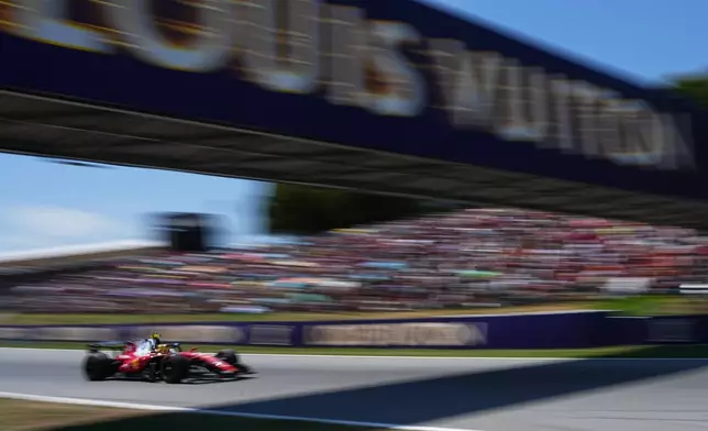 Ferrari driver Lewis Hamilton of Britain steers his car during the Spain F1 Grand Prix race at the Barcelona Catalunya racetrack in Montmelo, near Barcelona, Spain, Sunday, June 14, 2026. (AP Photo/Fatima Shbair)