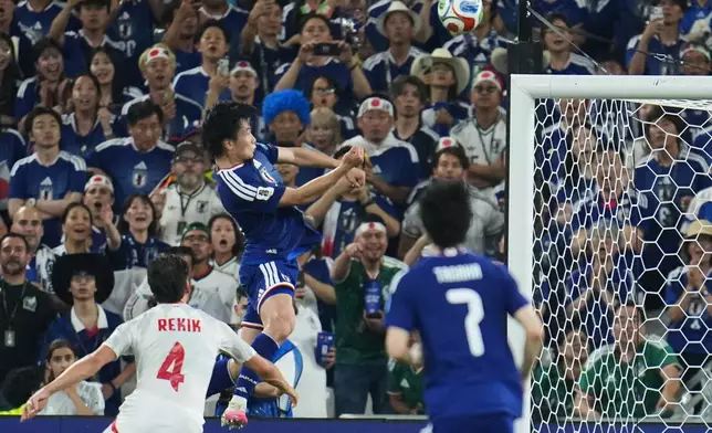 Japan's Ayase Ueda, center, scores their fourth goal with a header against Tunisia during the World Cup Group F soccer match in Guadalupe, near Monterrey, Mexico, Saturday, June 20, 2026. (AP Photo/Matias Delacroix)