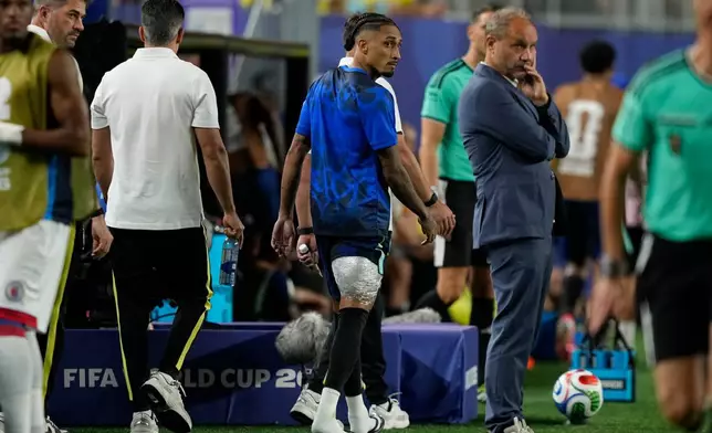 Brazil's Raphinha wears an ice pack on his leg after leaving the field during the World Cup Group C soccer match between Brazil and Haiti in Philadelphia, Friday, June 19, 2026. (AP Photo/Matt Slocum)