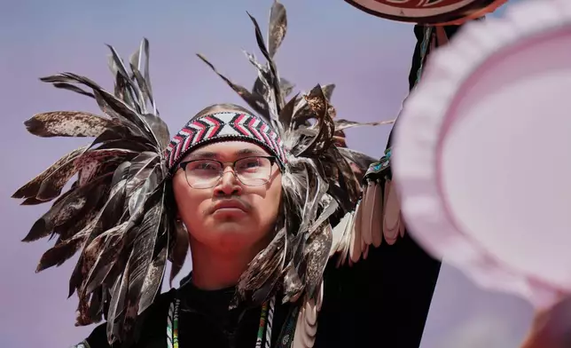 First Nation people perform during the opening ceremony for the World Cup Group B soccer match between Canada and Bosnia in Toronto, Friday, June 12, 2026. (AP Photo/Stephanie Scarbrough)