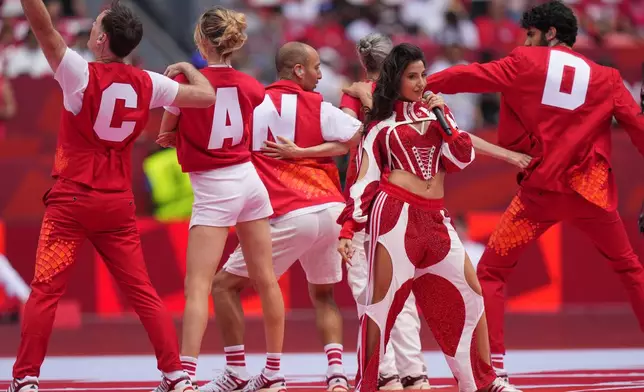 Performers take part in the opening ceremony for the World Cup Group B soccer match between Canada and Bosnia in Toronto, Friday, June 12, 2026. (AP Photo/Stephanie Scarbrough)