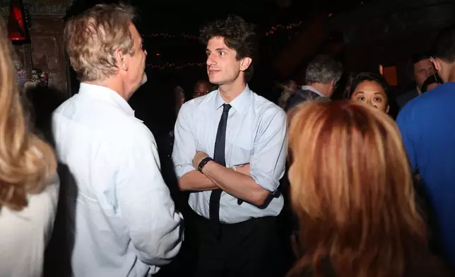 Democratic congressional candidate Jack Schlossberg greets supporters during an election night watch party Tuesday, June 23, 2026, in New York. (AP Photo/Heather Khalifa)