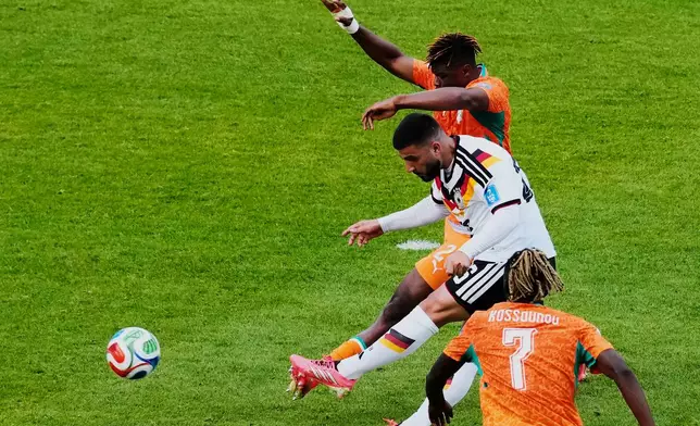 Germany's Deniz Undav (26) scores their second goal during the World Cup Group E soccer match between Germany and Ivory Coast in Toronto, Saturday, June 20, 2026. (Chris Young/The Canadian Press via AP)