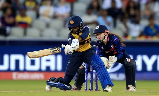Sri Lanka's Kavisha Dilhari bats during the ICC Women's T20 World Cup match at Emirates Old Trafford in Manchester, England, on Friday June 26, 2026. (Nigel French/PA via AP)