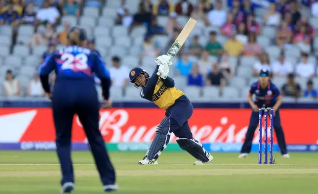 Sri Lanka's Imesha Dulani bats during the ICC Women's T20 World Cup match at Emirates Old Trafford in Manchester, England, on Friday June 26, 2026. (Nigel French/PA via AP)