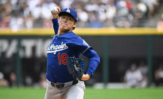 Los Angeles Dodgers pitcher Yoshinobu Yamamoto, of Japan, delivers during the first inning of a baseball game against the Chicago White Sox, Saturday, June 13, 2026, in Chicago. (AP Photo/Matt Marton)