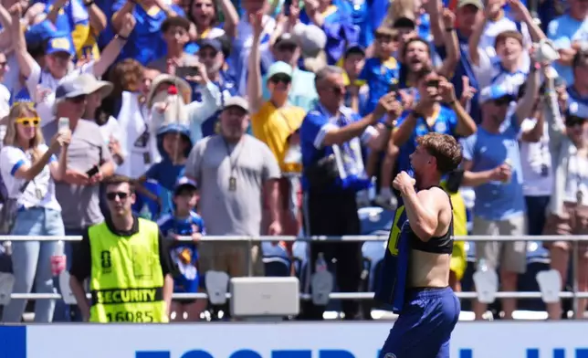 Bosnia's Ermin Mahmic (26) celebrates after scoring scores his side's third goal during the World Cup Group B soccer match between Bosnia and Qatar in Seattle Wednesday, June 24, 2026. (AP Photo/Manu Fernandez)