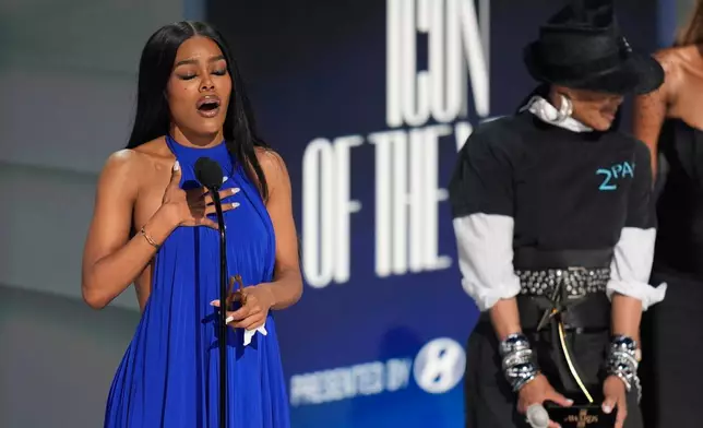 Teyana Taylor accepts the Icon of the Year award during the BET Awards on Sunday, June 28, 2026, at the Peacock Theater in Los Angeles. (AP Photo/John Locher)