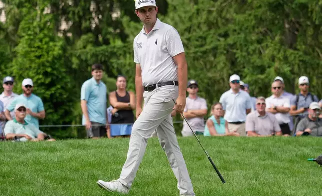 J.T. Poston reacts to his chip shot onto the sixth green during the third round of the Memorial golf tournament, in Dublin, Ohio, Saturday, June 6, 2026. (AP Photo/Sue Ogrocki)