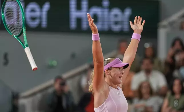 Russia's Mirra Andreeva reacts after winning the semifinal tennis match against Ukraine's Marta Kostyuk at the French Open in Paris, Thursday, June 4, 2026. (AP Photo/Thibault Camus)