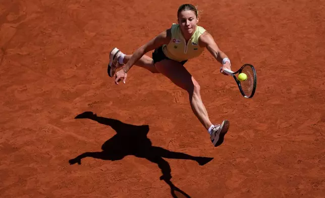 Poland's Maja Chwalinska returns to Russia's Mirra Andreeva during their final women's tennis match at the French Open in Paris, Saturday, June 6, 2026. (AP Photo/Christophe Ena)