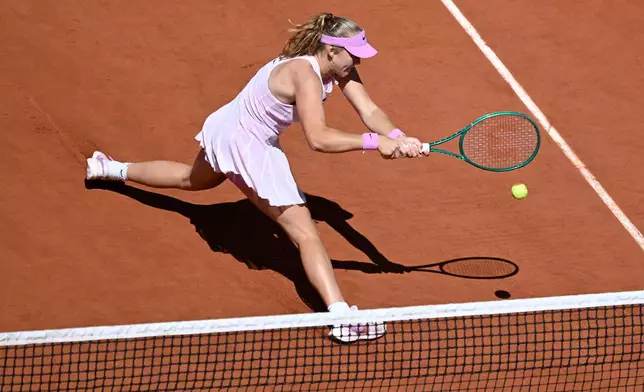 Russia's Mirra Andreeva returns during the final tennis match against Poland's Maja Chwalinska at the French Open in Paris, Saturday, June 6, 2026. (AP Photo/Emma Da Silva)