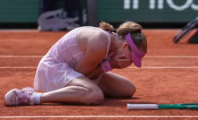 Russia's Mirra Andreeva ewacts after winning the final tennis match against Poland's Maja Chwalinska at the French Open in Paris, Saturday, June 6, 2026. (AP Photo/Thibault Camus)