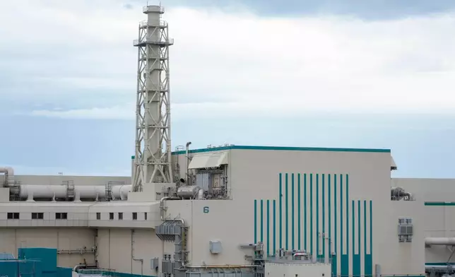FILE - The Unit 6 reactor building is pictured during a media tour at Tokyo Electric Power Company Holdings' (TEPCO) Kashiwazaki-Kariwa nuclear power station in Kariwa Village, Niigata prefecture, Japan on Friday, May 1, 2026. (Toru Hanai/Pool Photo via AP, File)