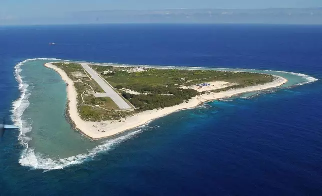 This aerial photo shows Minamitorishima, an island administered by Ogasawara village, which is part of Tokyo on Nov. 21, 2012. (Japan Pool/Kyodo News via AP)