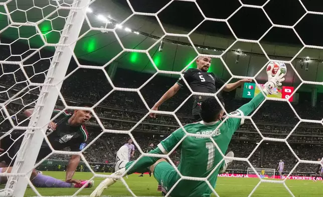 Mexico goalkeeper Raul Rangel (1) makes a save on the goal line during the World Cup Group A soccer match between Mexico and South Korea in Zapopan, near Guadalajara, Mexico, Thursday, June 18, 2026. (AP Photo/Fernando Llano)