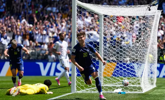 Bosnia's Esmir Bajraktarevic, right, celebrates after Qatar's Sultan Albrake scored an own goal during the World Cup Group B soccer match in Seattle, Wednesday, June 24, 2026. (AP Photo/Lindsey Wasson)